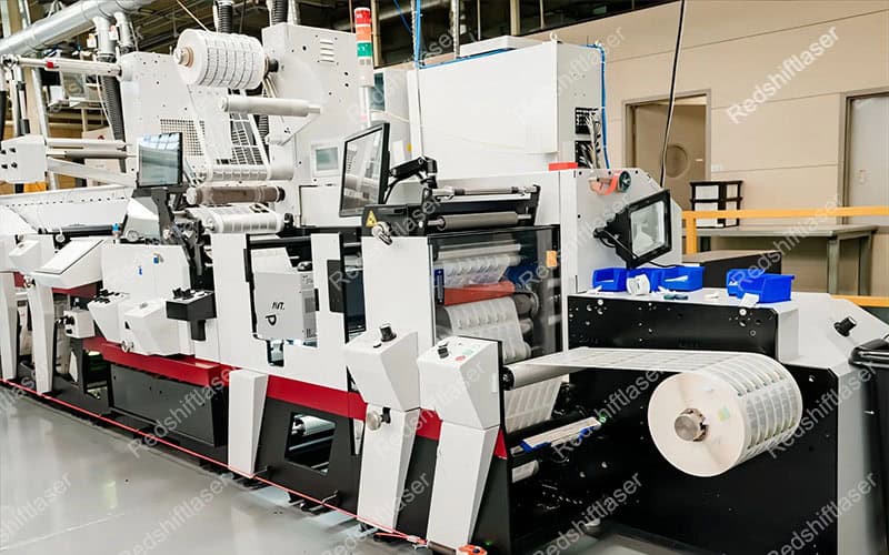 CO2 laser cutter expanding a printing business A CO2 laser cutter working in a modern print shop environment