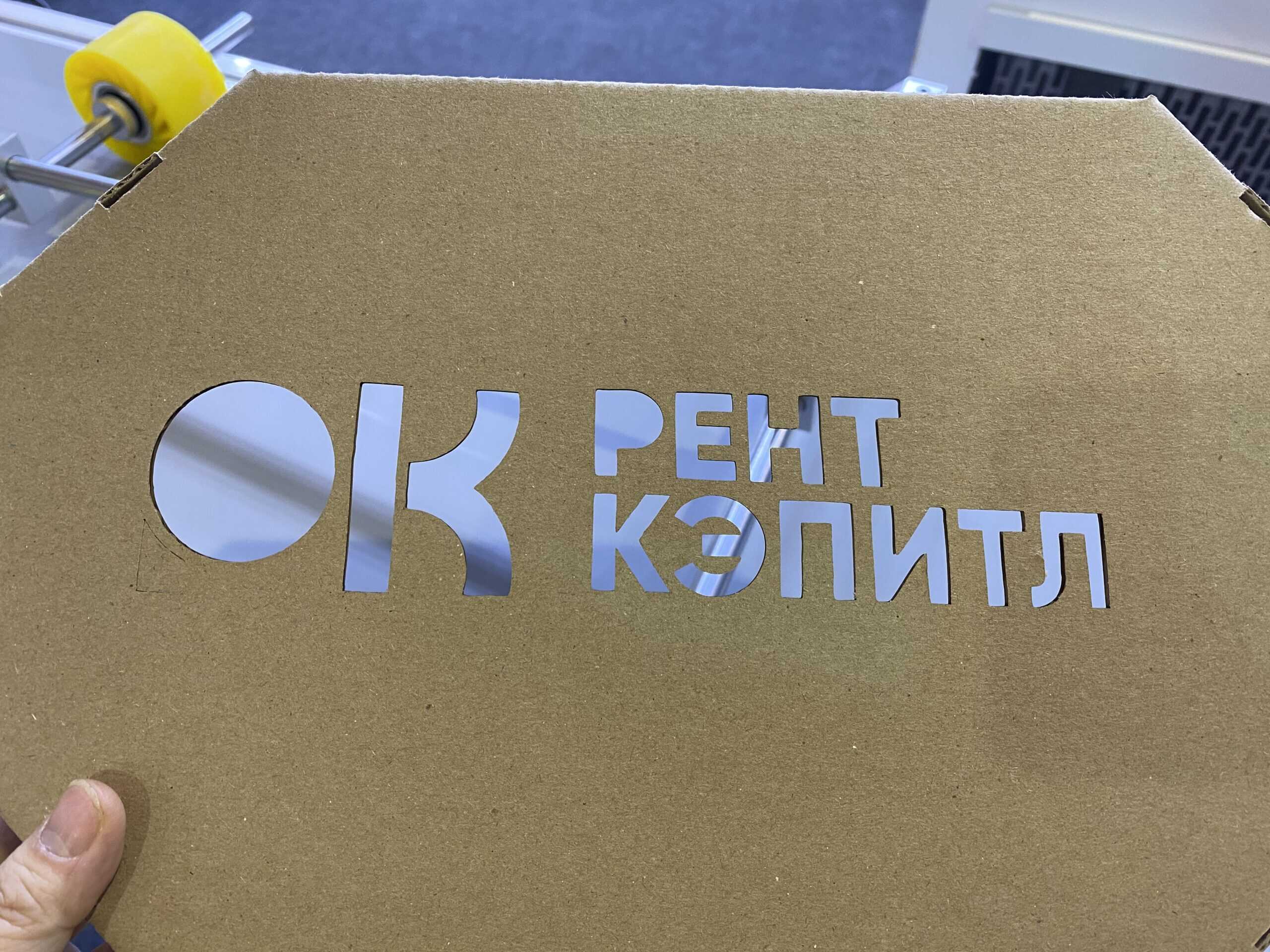 A technician performing maintenance on a CO2 laser tube