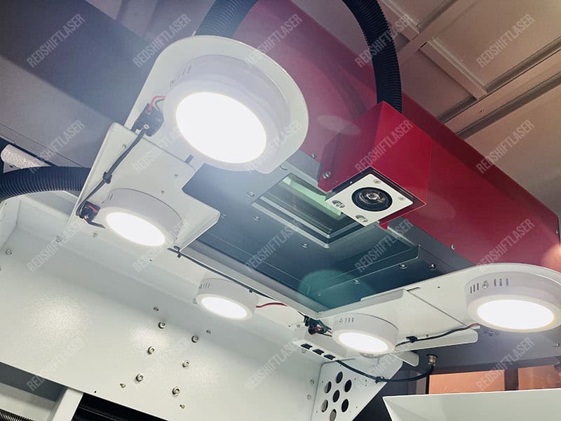 3D Galvo CO2 laser for denim brands Jeans on a 3D mannequin being marked by a 3D Galvo laser, showing a seamless pattern