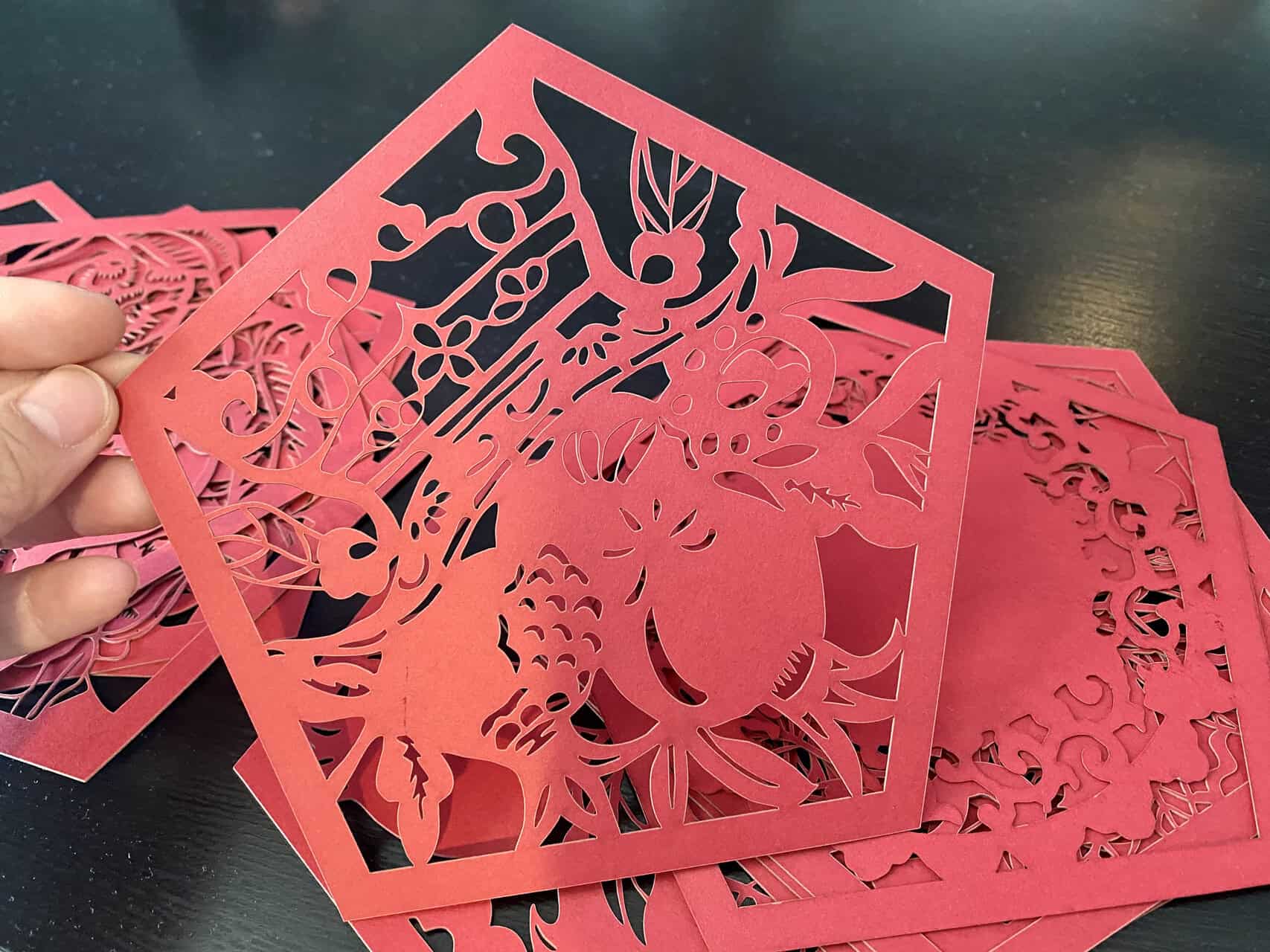 Laser Cutter Air Assist Nozzle Detail A close-up of a laser head with a visible air-assist nozzle pointed directly at the cut line