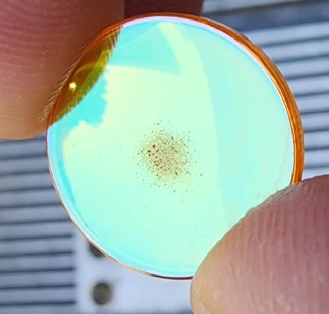 Damaged and Dirty ZnSe Focus Lens with Thermal Lensing Residue