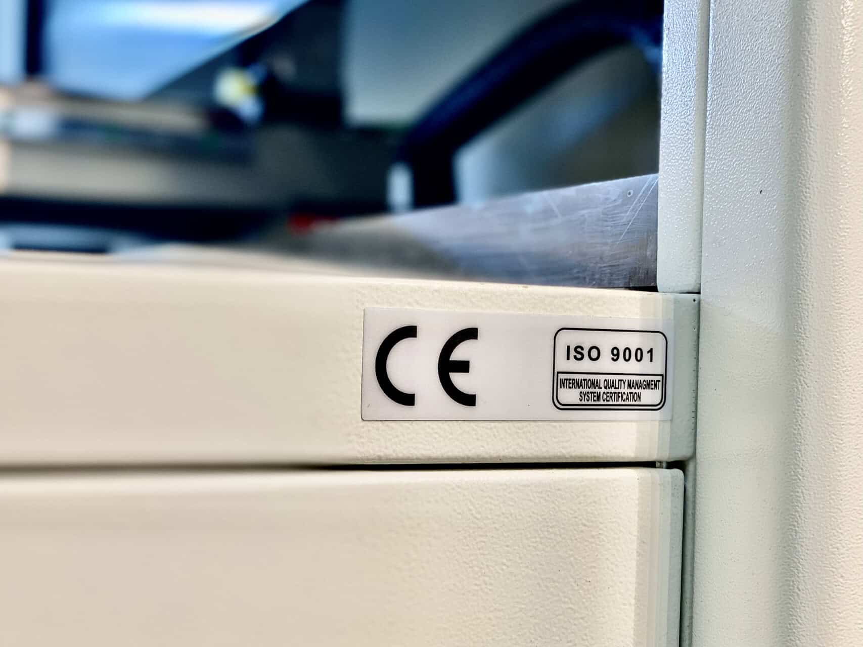 A collage of products made from laser-cut felt: an acoustic wall panel, a laptop sleeve, and a decorative placemat