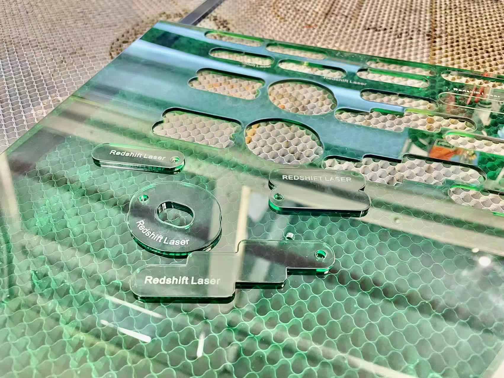 An intricate wooden mandala art piece cut by a laser, hanging on a wall