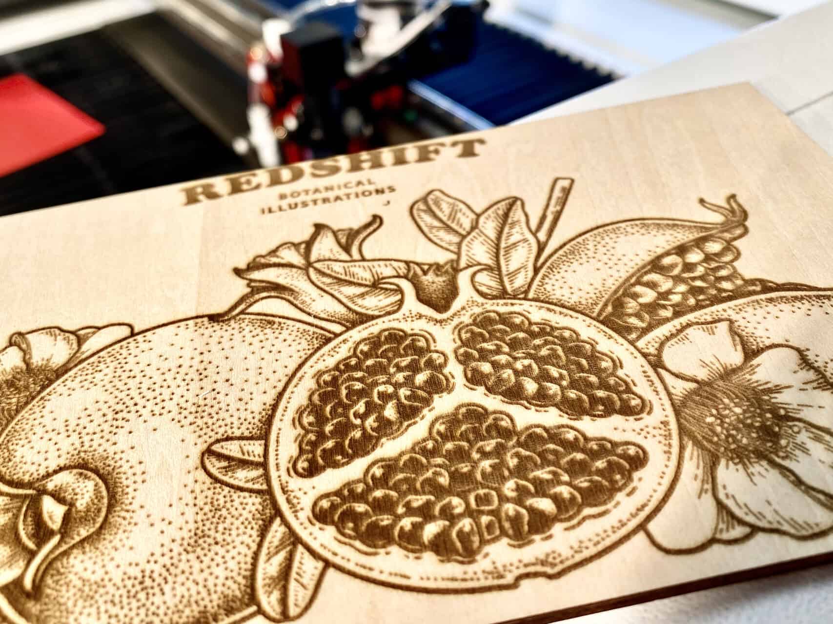 A control panel view of laser software showing sliders for power, speed, and frequency settings