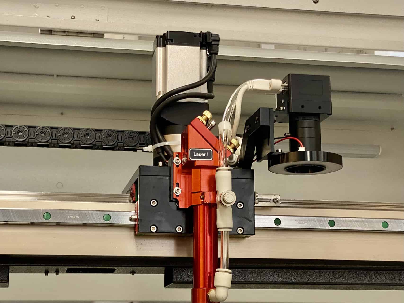 A Redshift Laser machine with a large bed size cutting a full sheet of Kaizen foam