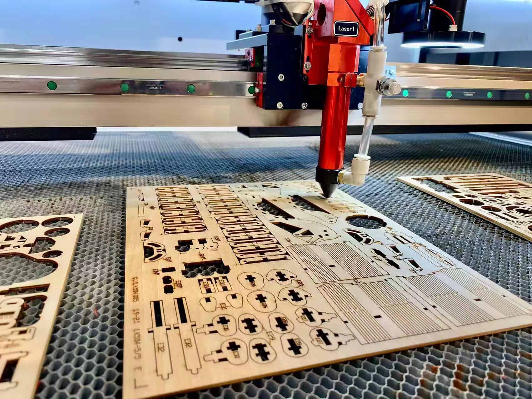 A collage showing materials like wood and acrylic for CO2, and steel and aluminum for fiber